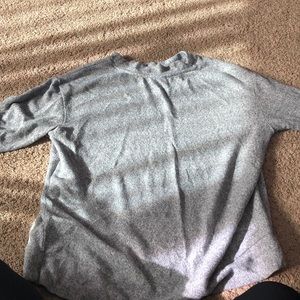 A grey sweater